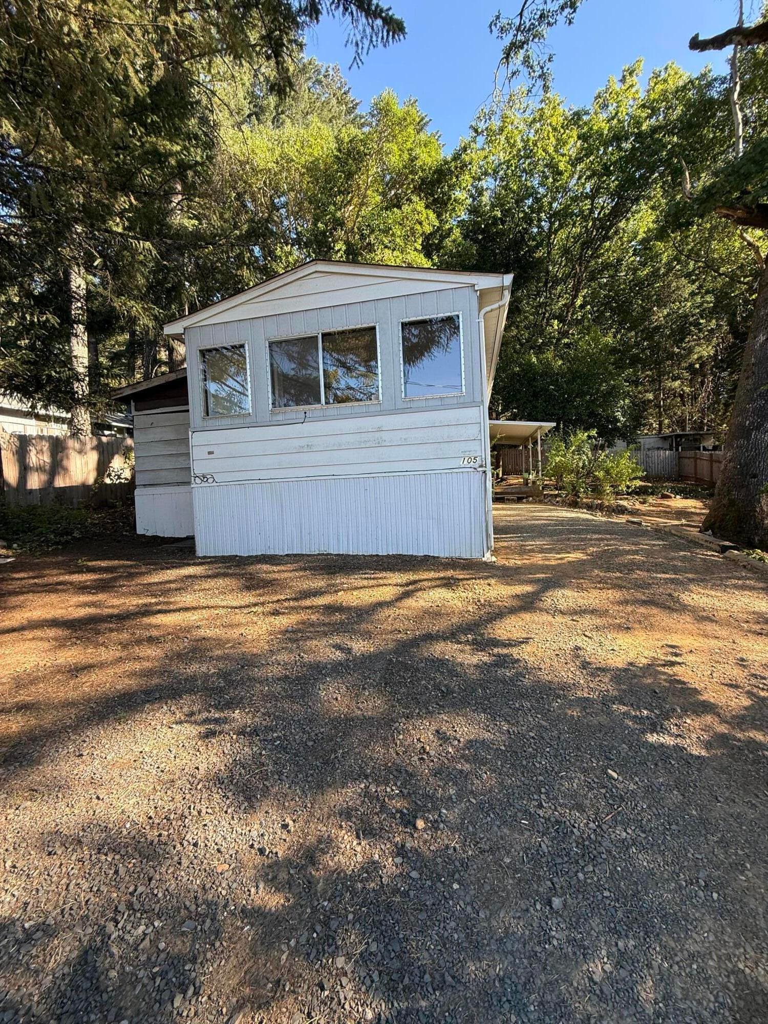 closer view of home from street. Photo 2 of 23, 105 Raymond Street, Cave Junction, OR 97523