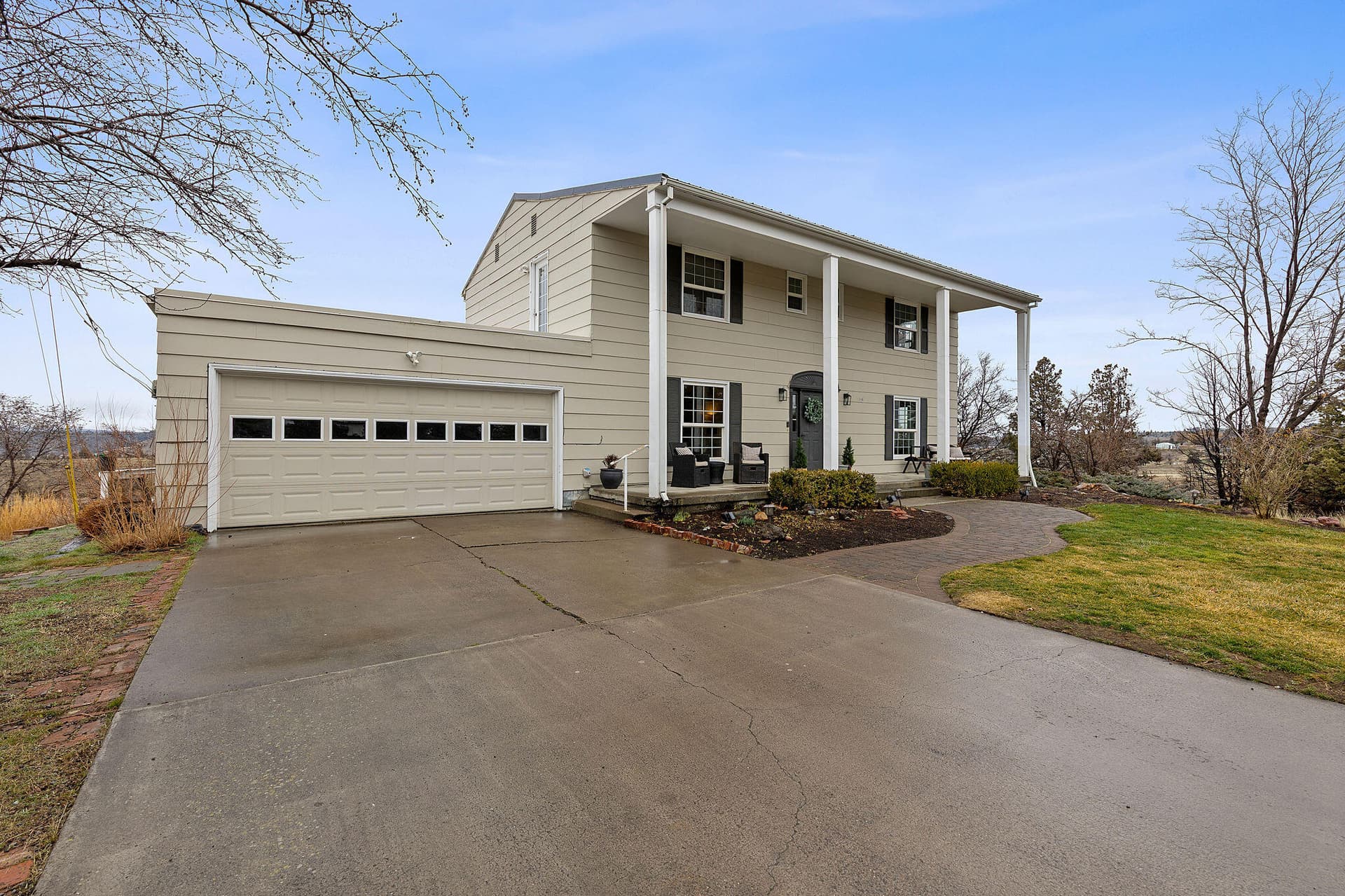 Front Exterior and Driveway. Photo 5 of 52, 1103 NE Richard Lane, Madras, OR 97741
