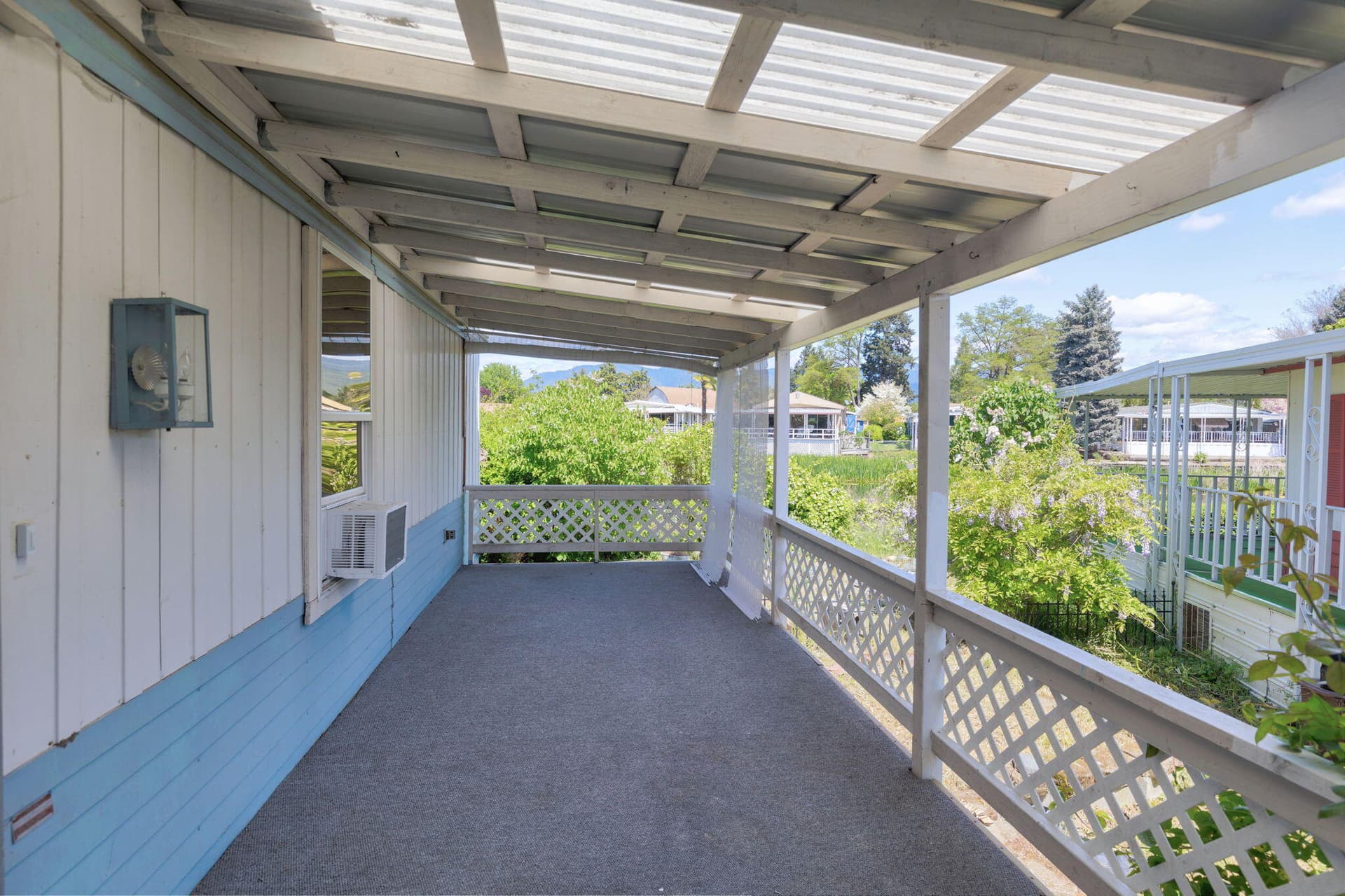 covered wrap around deck. Photo 3 of 30, 311 Bandy Way, Grants Pass, OR 97526