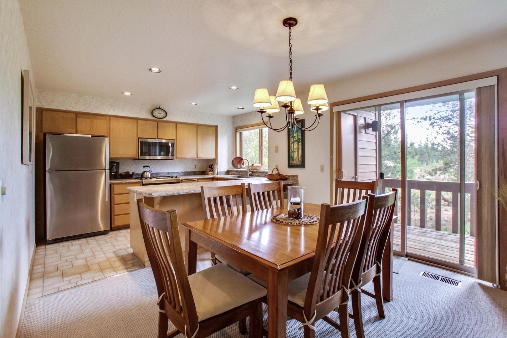 R1 dining room to kitchen. Photo 5 of 28, 57321 Beaver Ridge Loop Unit 1, Sunriver, OR 97707