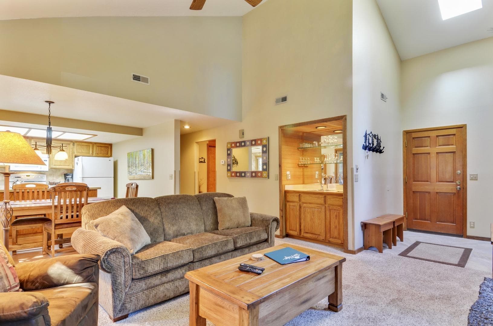 Living Room looking toward wet bar and h. Photo 5 of 23, 57301 Beaver Ridge Loop Unit 10, Sunriver, OR 97707