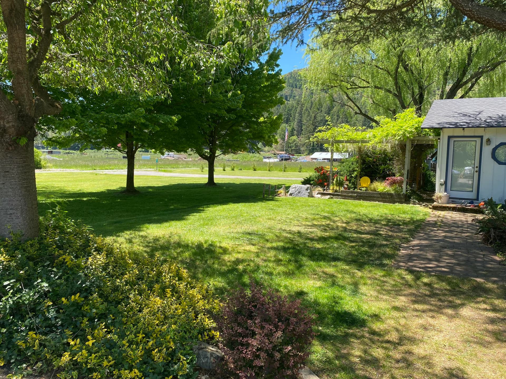 lush landscaping. Photo 2 of 51, 753 W Evans Creek Road, Rogue River, OR 97537