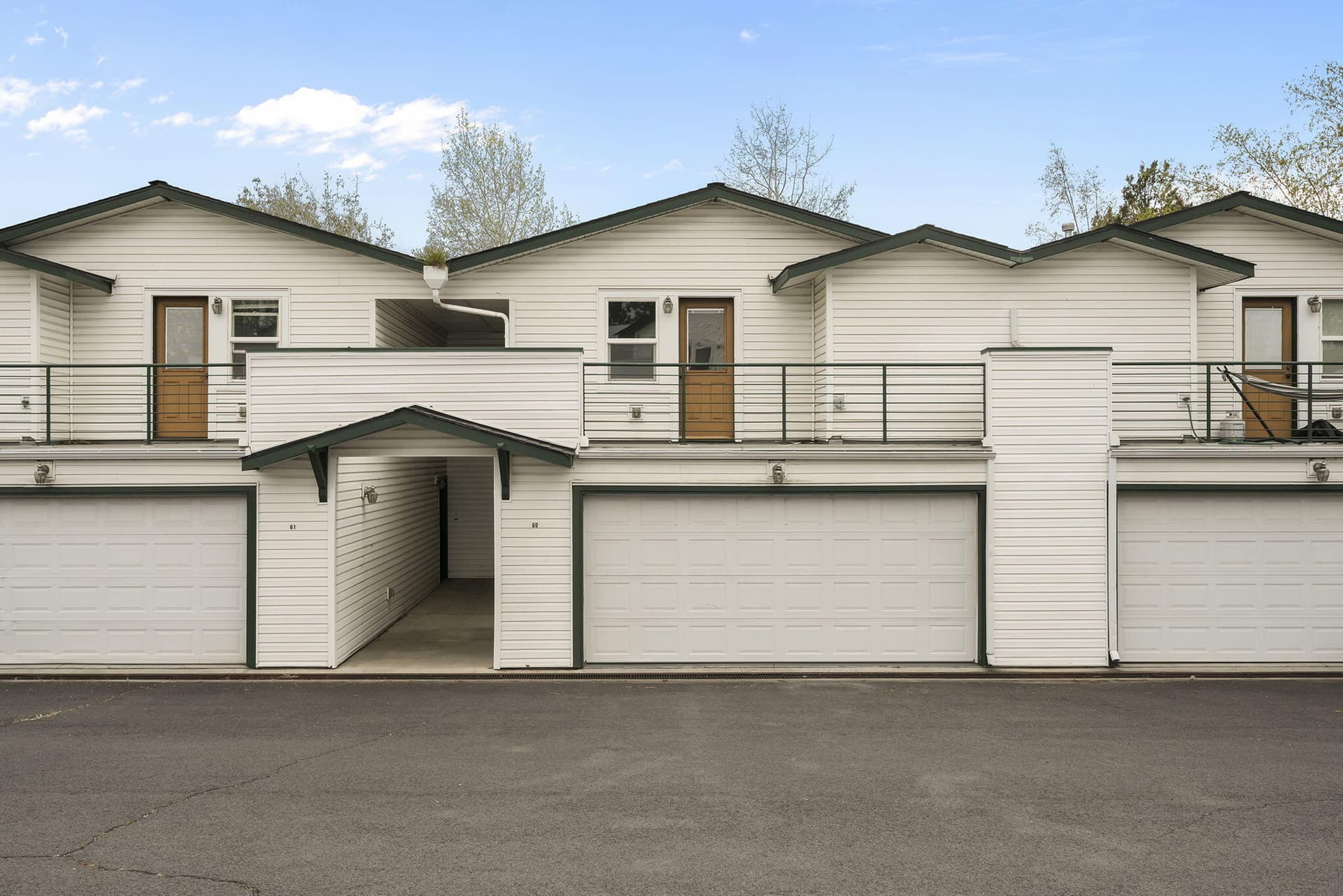 Garage and Entry. Photo 2 of 29, 438 NW 19th Street Unit UNIT 60, Redmond, OR 97756