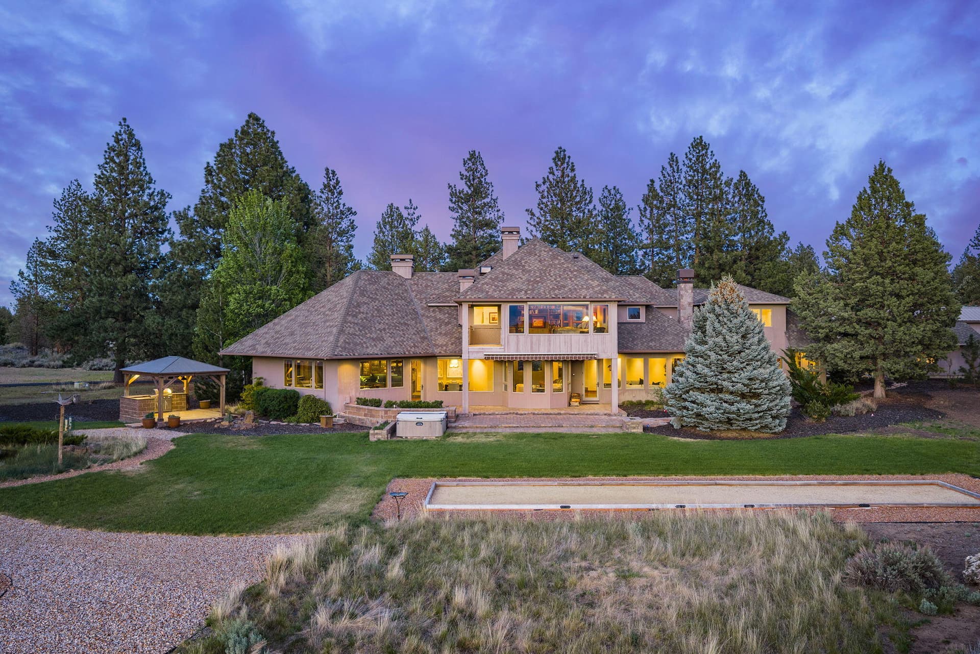 3. Back of house twilight. Photo 3 of 60, 21725 Rickard Road, Bend, OR 97702