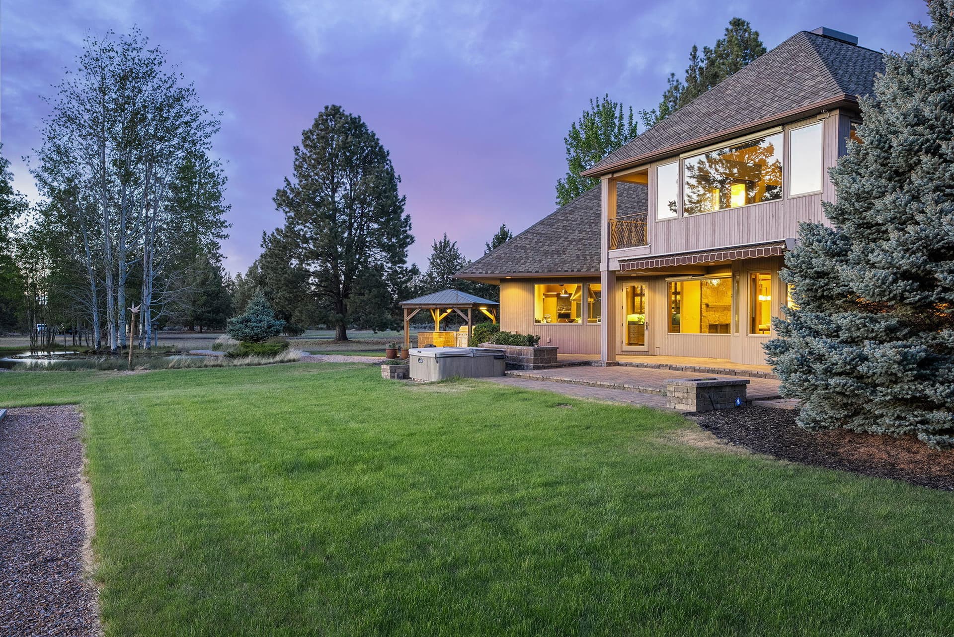 4. Manicured lawn twilight. Photo 4 of 60, 21725 Rickard Road, Bend, OR 97702