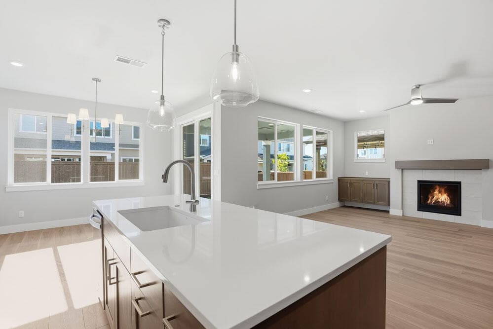 Kitchen to great room. Photo 4 of 21, 60943 SE Apollo Place, Bend, OR 97702