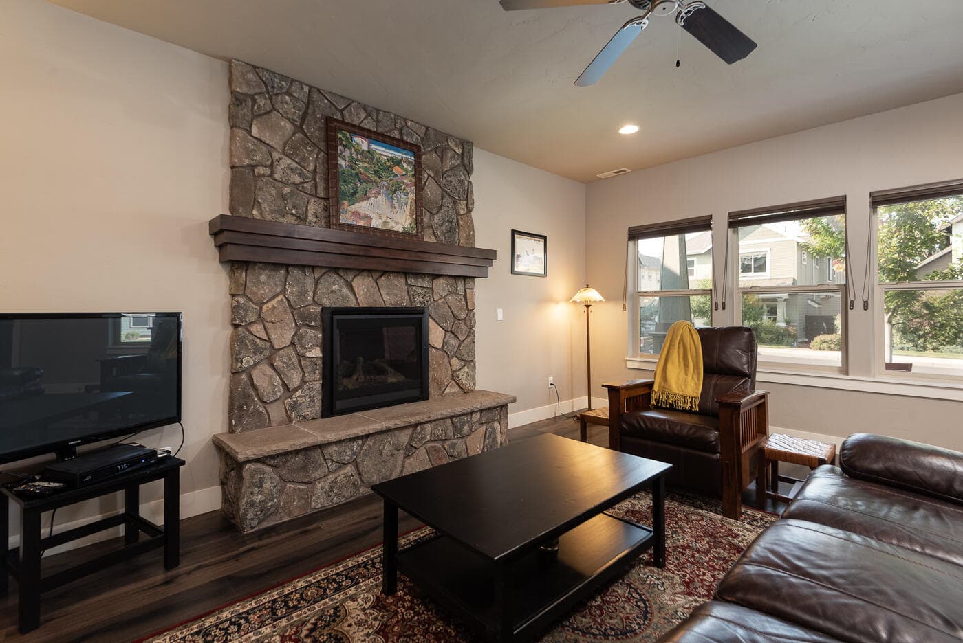 great room fireplace. Photo 4 of 31, 20527 SE Stanford Place, Bend, OR 97702
