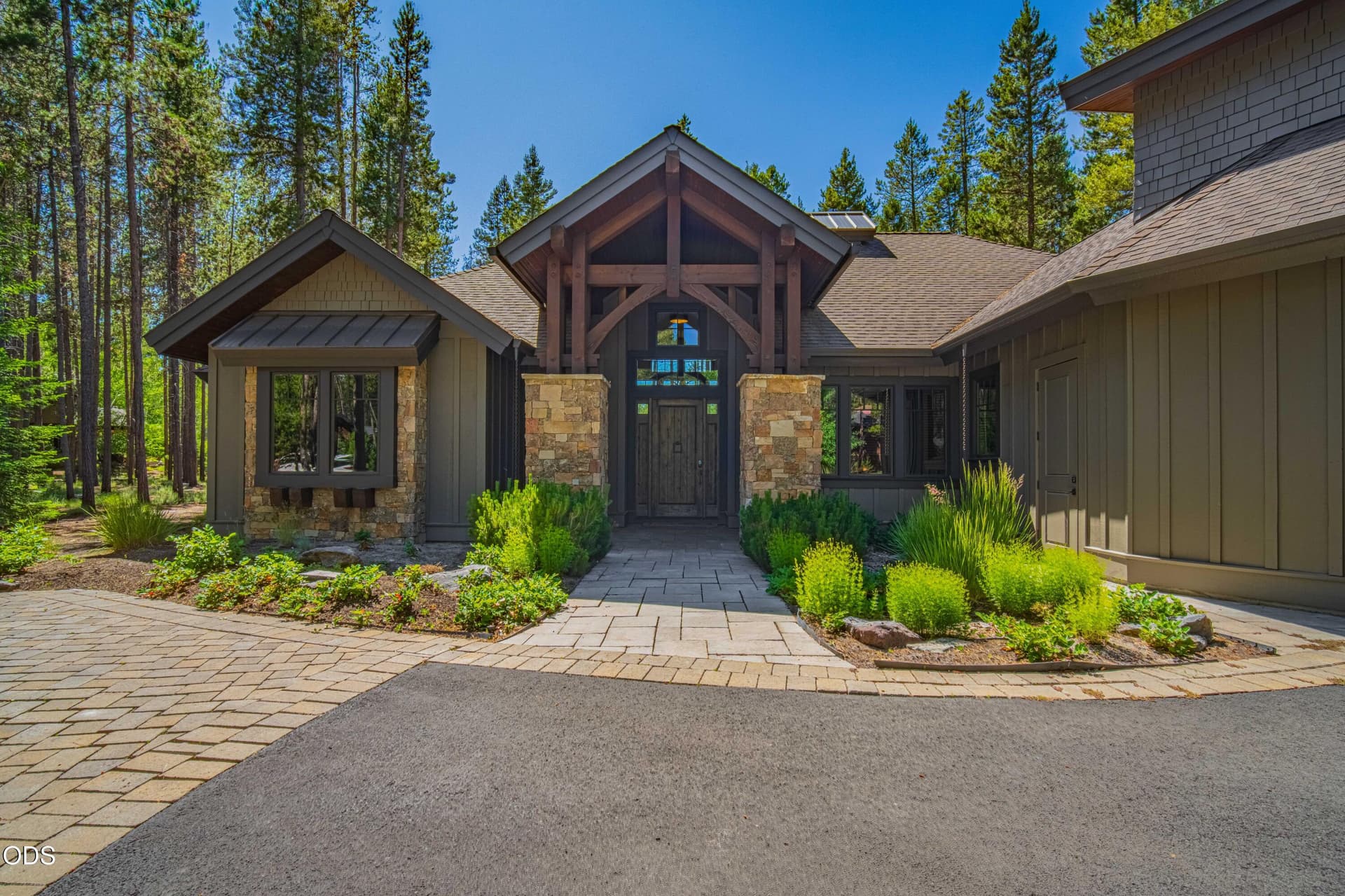 stone-timber-entry. Photo 3 of 75, 56240 Trailmere Circle Unit 239, Bend, OR 97707