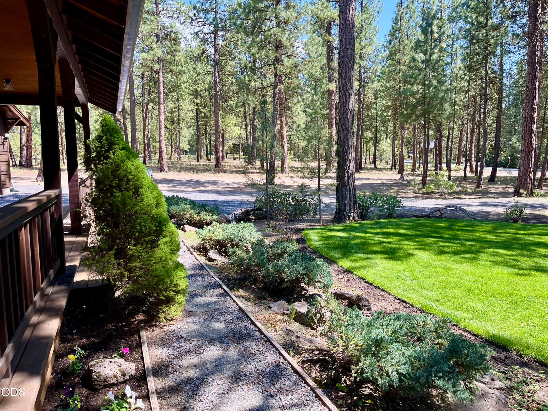 Front planter facing east at vacant lots. Photo 5 of 46, 53556 Kokanee Way, La Pine, OR 97739