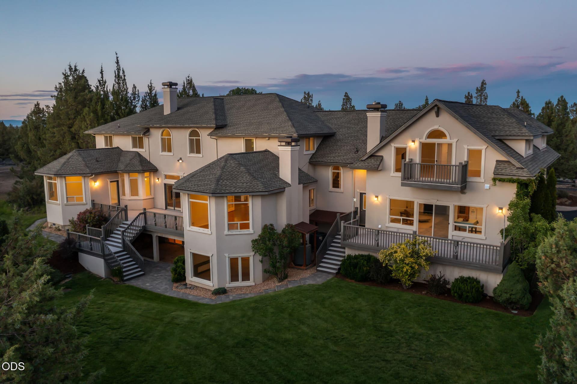 Back of home at twilight. Photo 2 of 60, 62354 NE Erickson Road, Bend, OR 97701