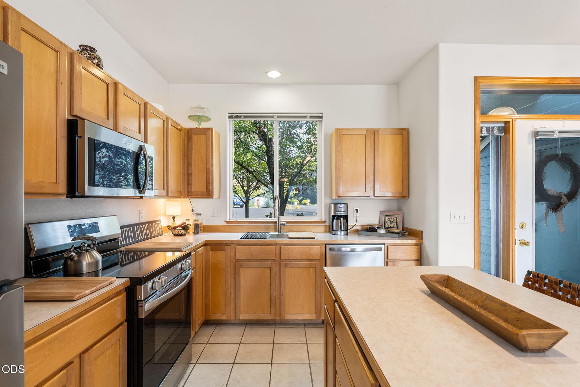 Kitchen with Island. Photo 4 of 27, 1141 Golden Pheasant Drive, Redmond, OR 97756
