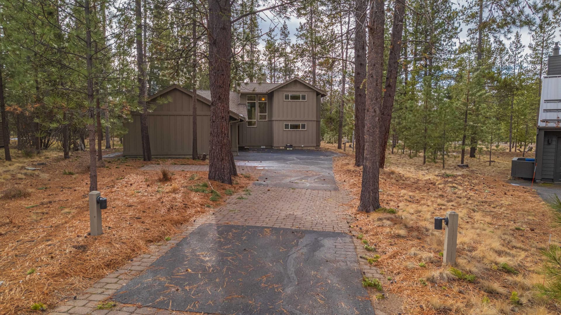 2 - front exterior. Photo 2 of 47, 57655 Aspen Lane Unit 2, Sunriver, OR 97707