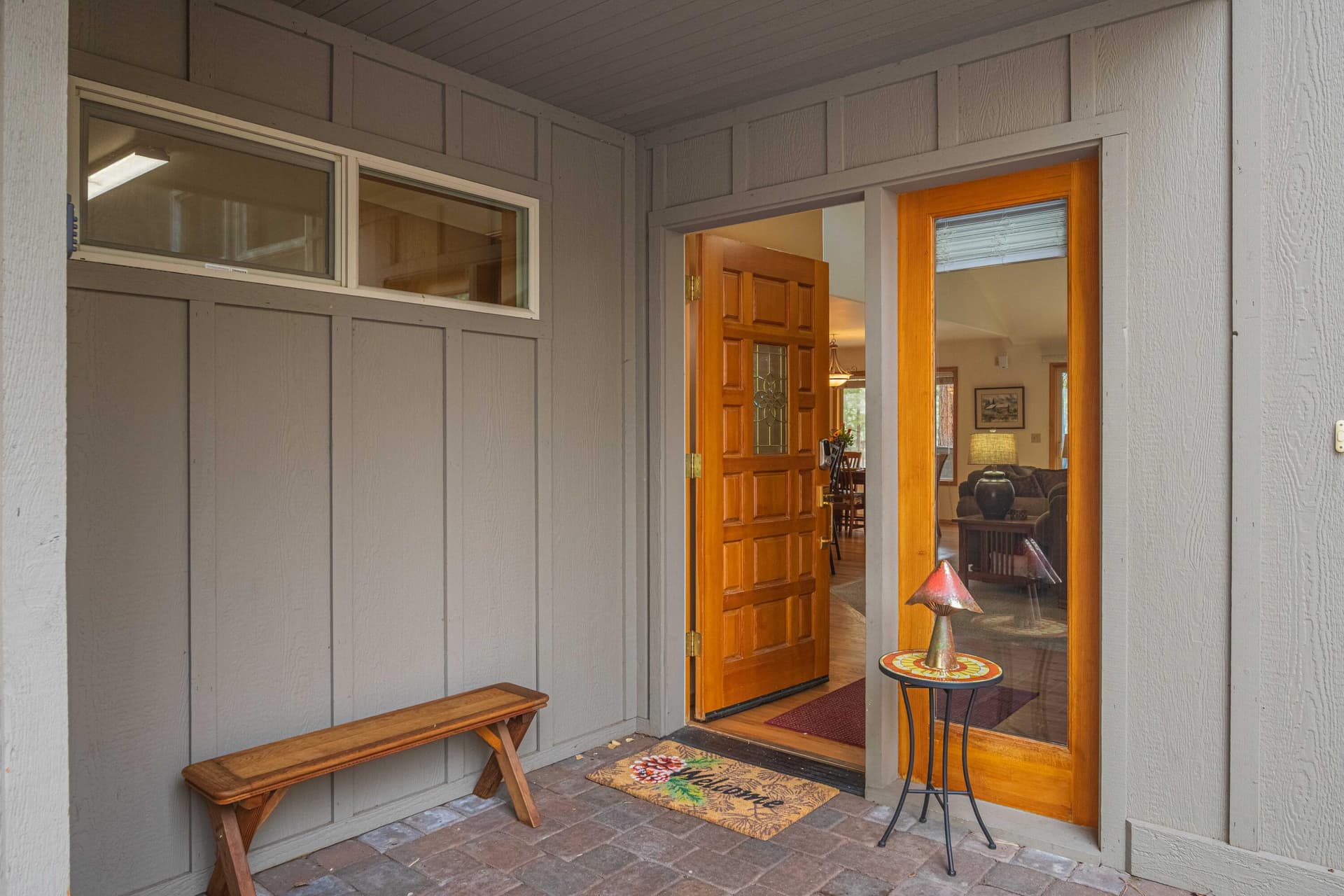 5 - entrance door open. Photo 5 of 47, 57655 Aspen Lane Unit 2, Sunriver, OR 97707
