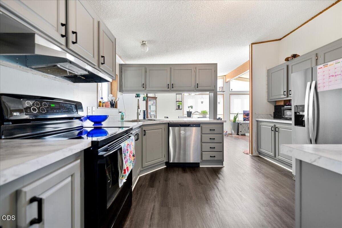 12-Kitchen 2. Photo 5 of 25, 3555 S Pacific Highway Unit SPC 188, Medford, OR 97501