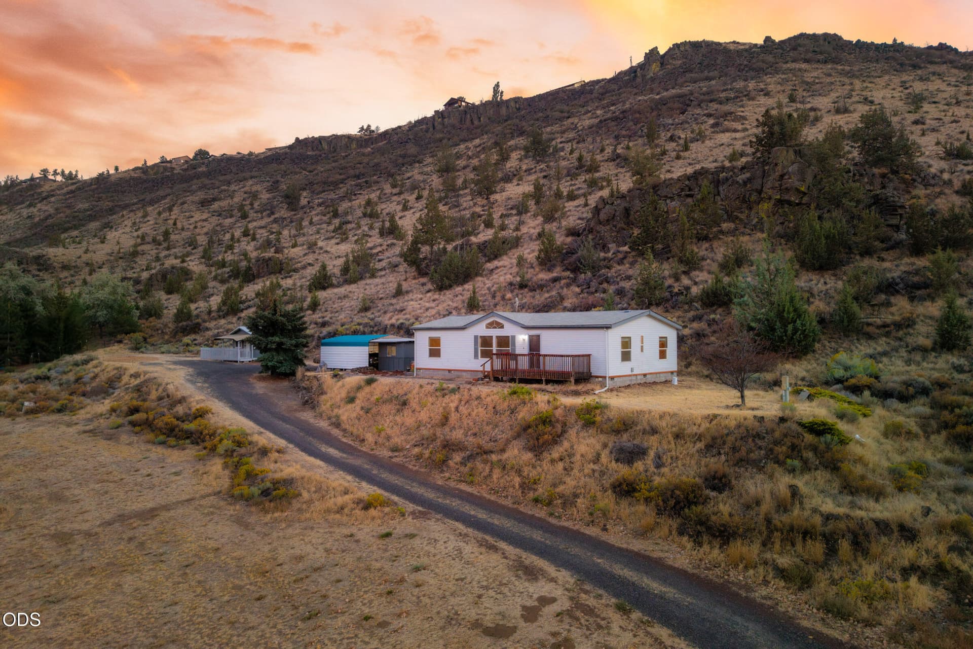 Twilight home shot. Photo 1 of 37, 11756 SW Horny Hollow Trail, Terrebonne, OR 97760