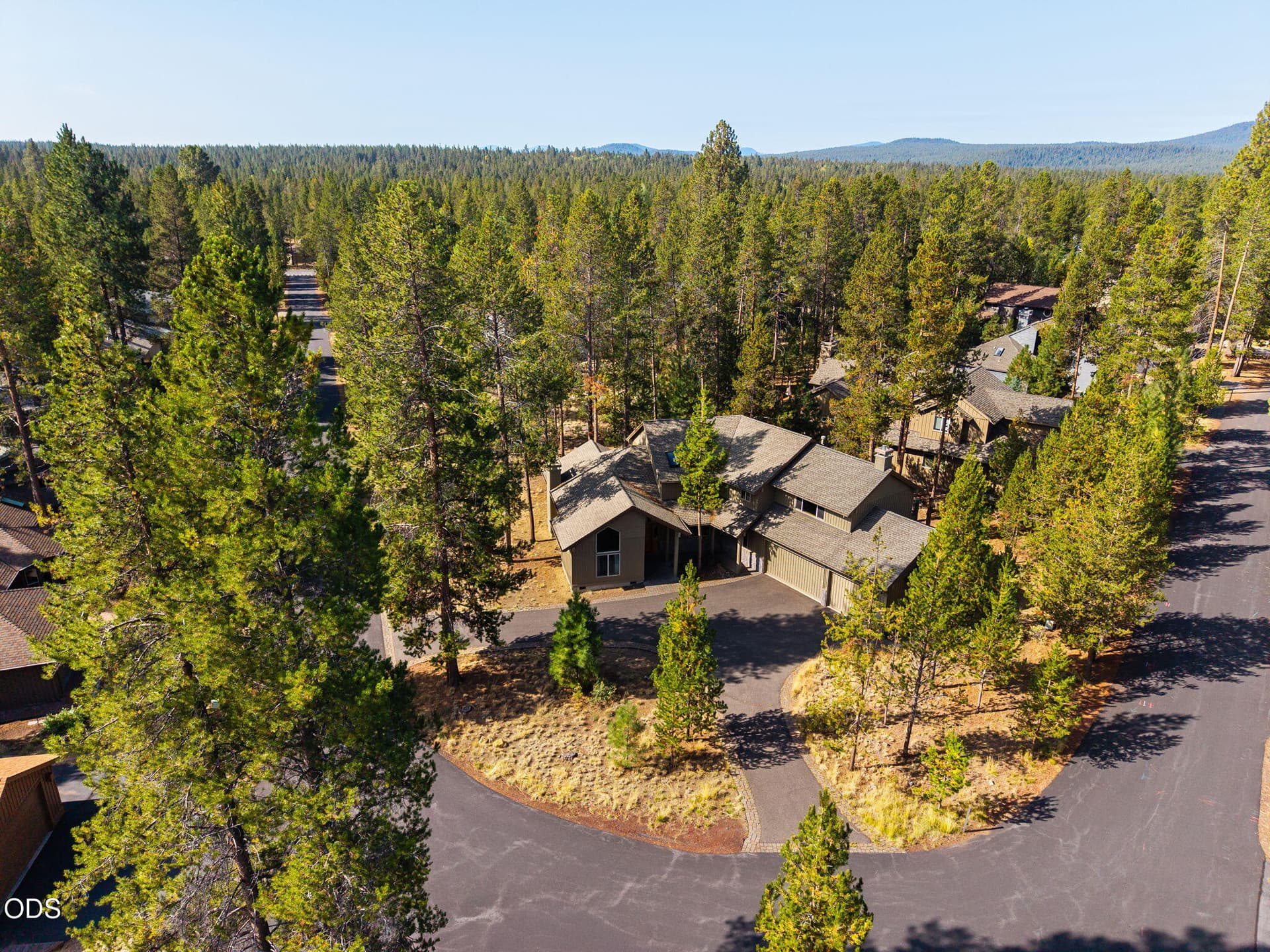 02. Drone Front of House. Photo 2 of 72, 18211 Oregon Loop Unit 1, Sunriver, OR 97707