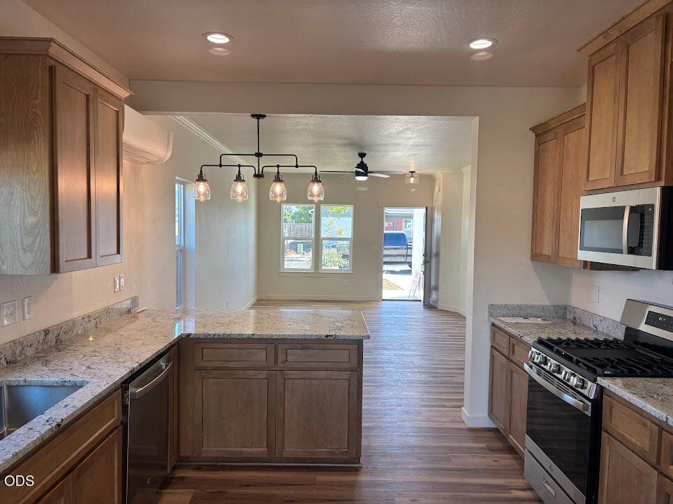 kitchen to great room. Photo 5 of 25, 729 Dahl Place Unit #5, Medford, OR 97501