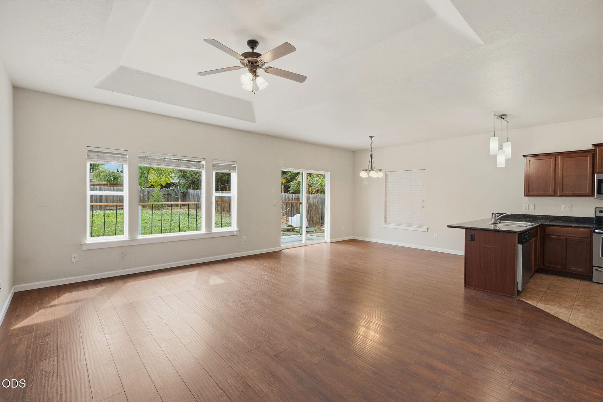 living room towards dining area. Photo 5 of 31, 113 Chelsea Court, Phoenix, OR 97535