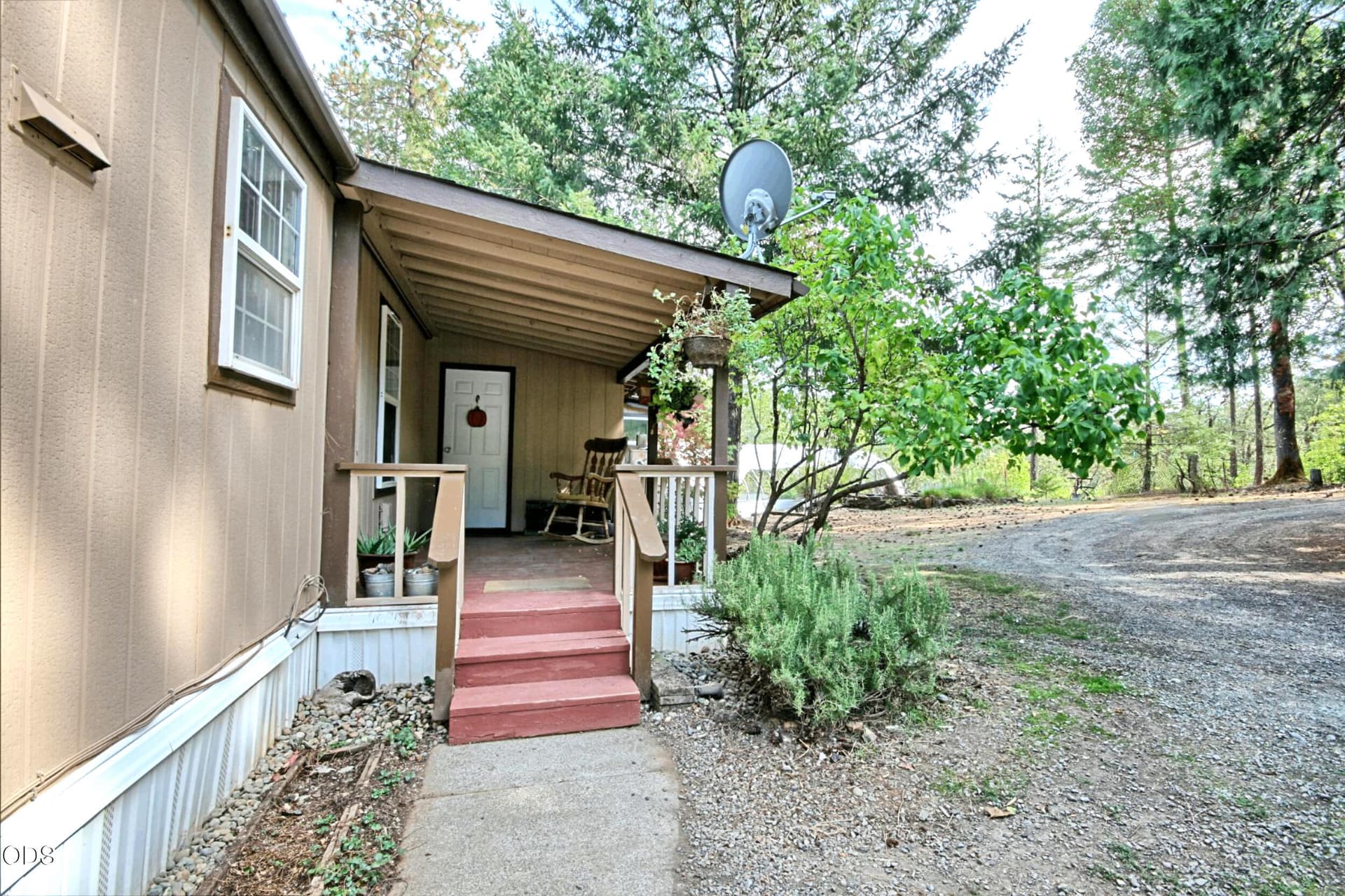 covered porch entry. Photo 4 of 40, 2461 W Evans Creek Road, Rogue River, OR 97537