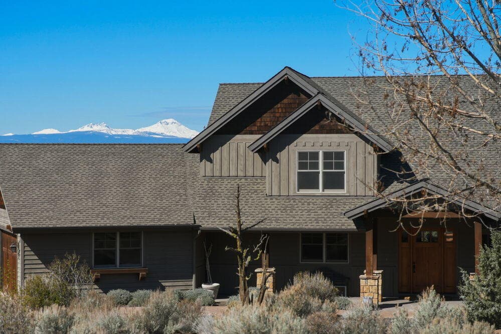 Exterior to West. Photo 2 of 47, 15361 SW Branding Iron Court, Powell Butte, OR 97753