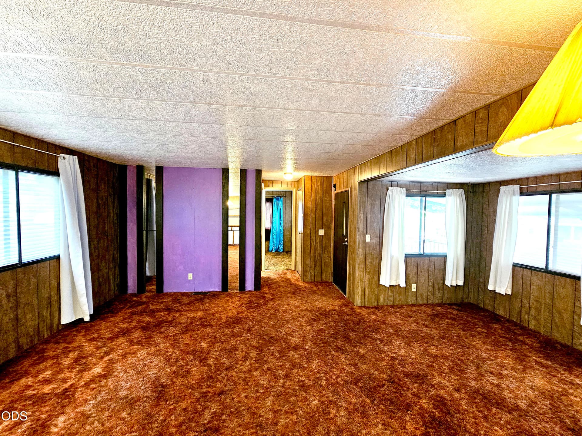 living room. Photo 5 of 19, 200 SW D Street Unit 10, Madras, OR 97741