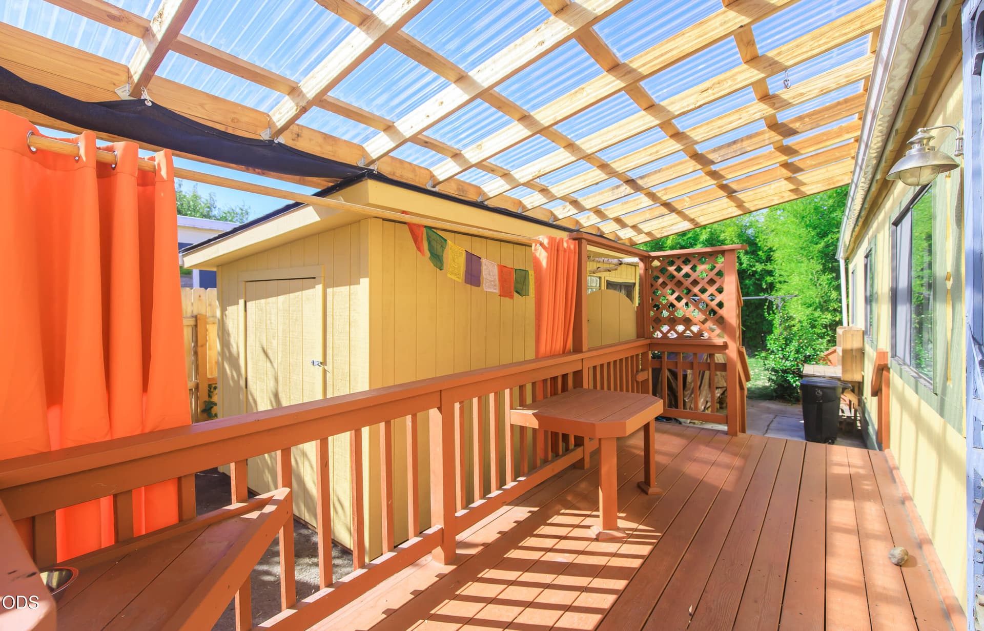 Front porch with privacy curtains. Photo 2 of 39, 321 Clay Street Unit SPC 47, Ashland, OR 97520