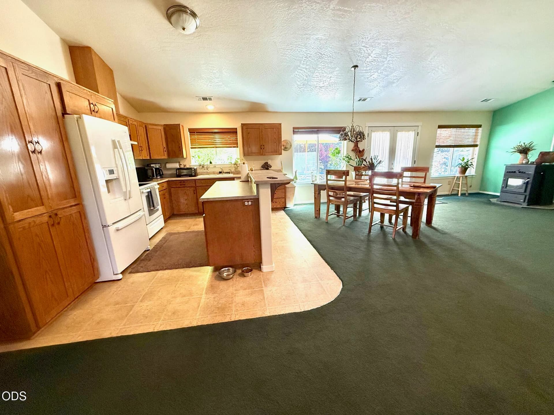 close up of kitchen and dining area. Photo 5 of 22, 259 Borica Drive, Selma, OR 97538