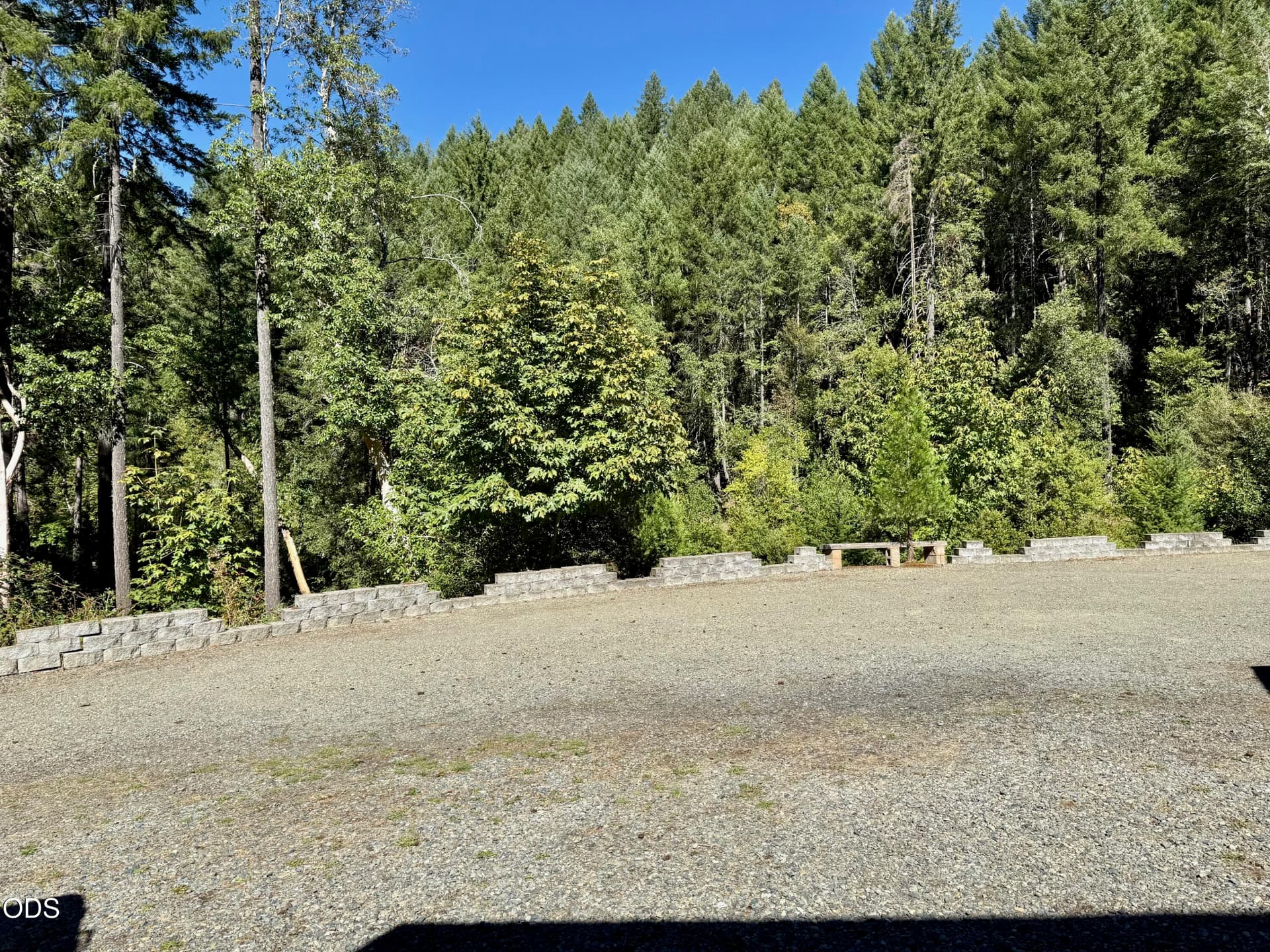 huge parking area with block wall along. Photo 4 of 22, 259 Borica Drive, Selma, OR 97538