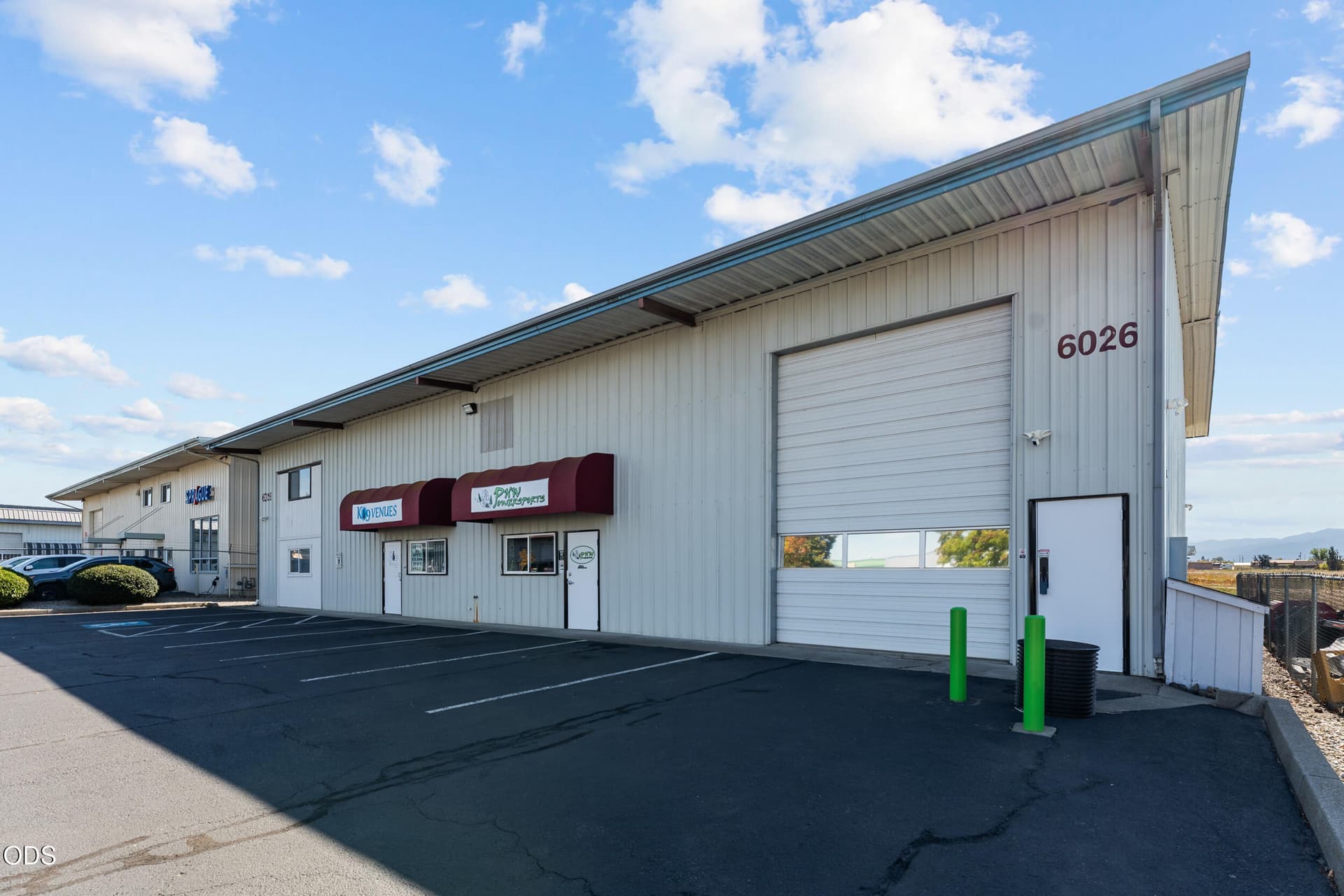 Shop side of building with roll up door. Photo 4 of 30, 6026 Crater Lake Avenue, Medford, OR 97502