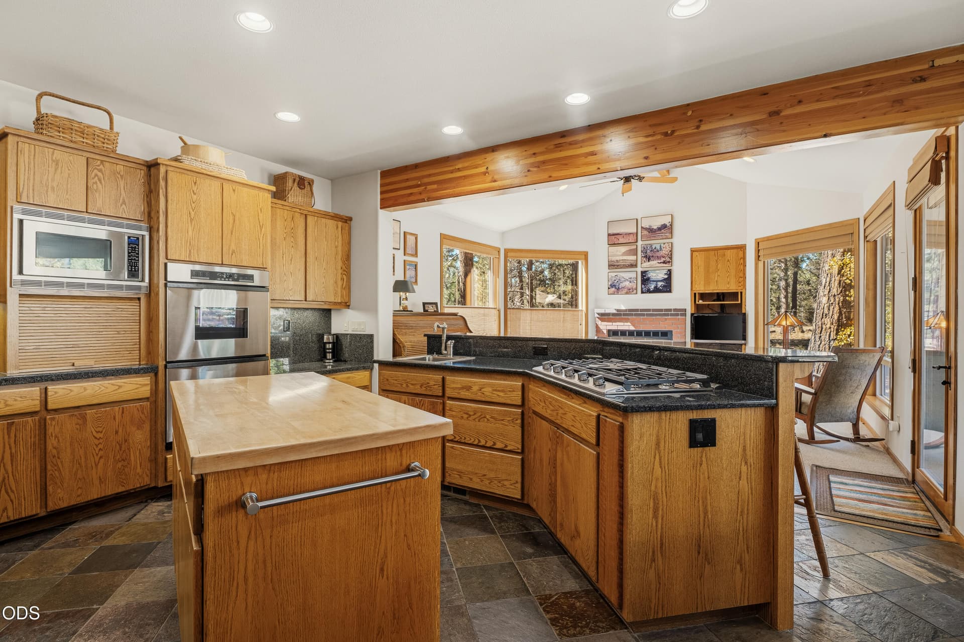 kitchen with breakfast bar. Photo 4 of 34, 58210 McNary Lane Unit 1, Sunriver, OR 97707