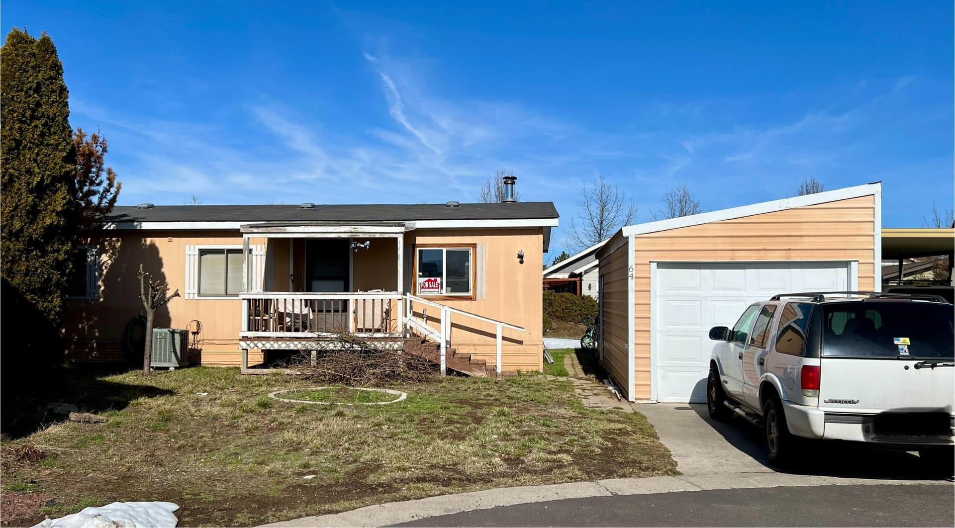 Front - Garage. Photo 2 of 21, 1515 NW Fir Avenue Unit UNIT 64, Redmond, OR 97756