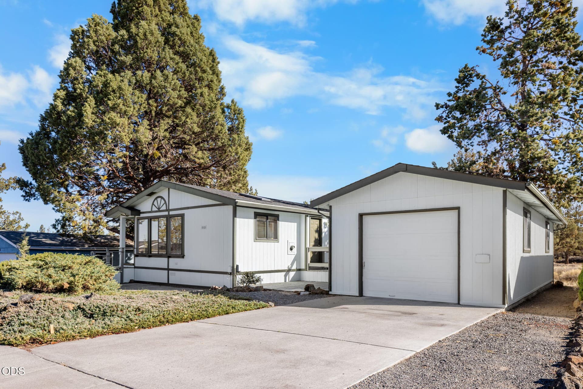 Front of House/Garage. Photo 1 of 31, 63704 Ranch Village Drive Unit # 97, Bend, OR 97701