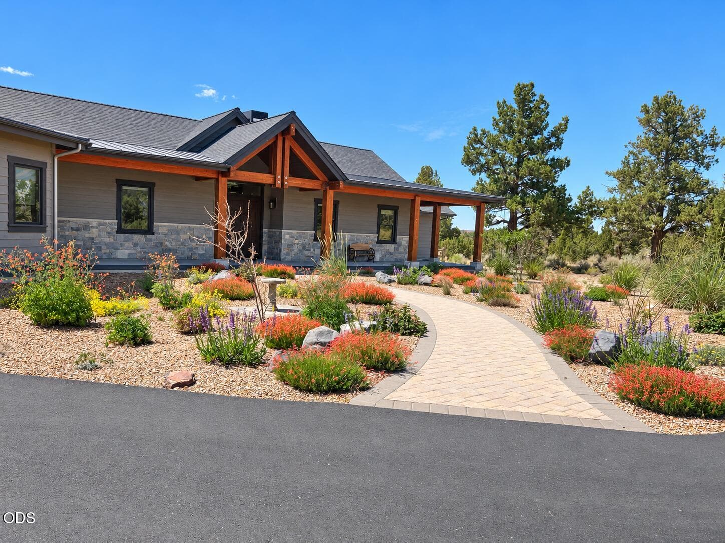 Sunlit Porch and Blooming Home Exterior. Photo 3 of 39, 16853 SW Starview Drive, Powell Butte, OR 97753