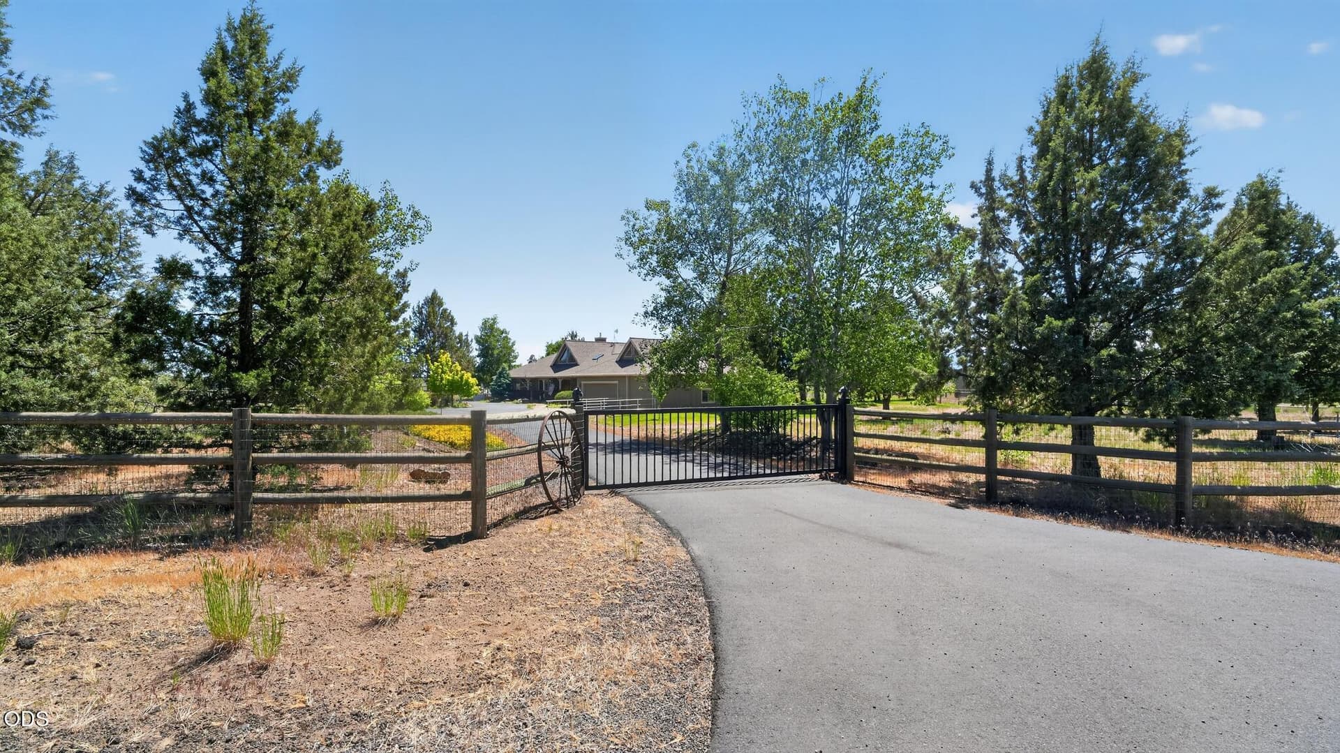 driveway gate. Photo 2 of 30, 18203 Fadjur Lane, Sisters, OR 97759